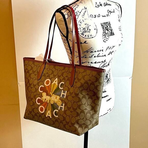 Classy Coach Radial Rainbow Signature Coated Canvas and Smooth Leather City Tote - Picture 1 of 16